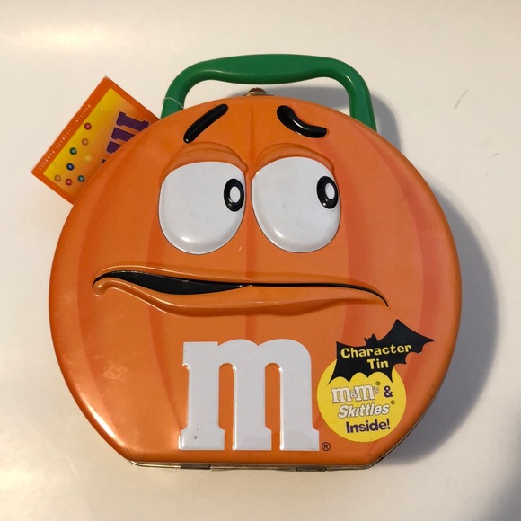 M&ms character tin. 2002 does not include candy.